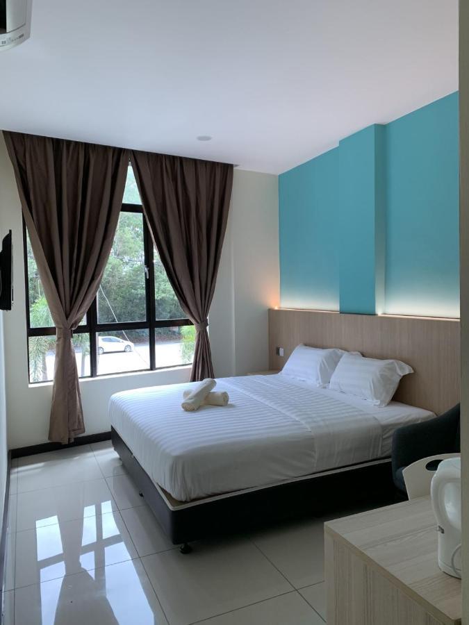 M Quality Hotel 话毛生 外观 照片